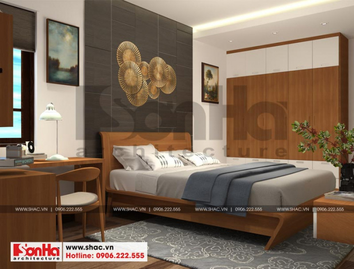 Thêm một phòng ngủ được thiết kế với đồ nội thất gỗ từ giường tủ đến bàn trang điểm 