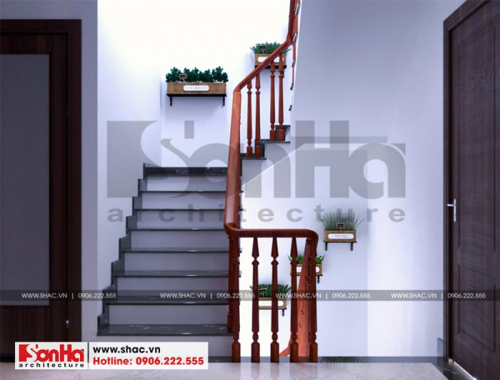 Hình ảnh thiết kế cầu thang ốp đá tay vịn gỗ cho nhà ống đẹp tại Hải Phòng 