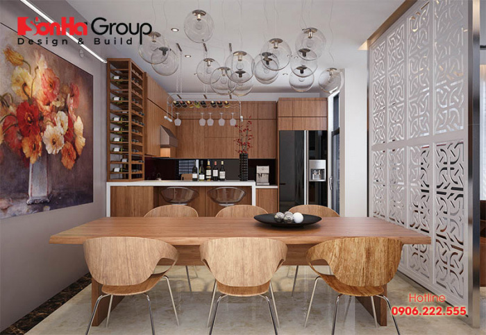 Mẫu thiết kế phòng bếp liên thông phòng ăn với nội thất gỗ bền, đẹp 