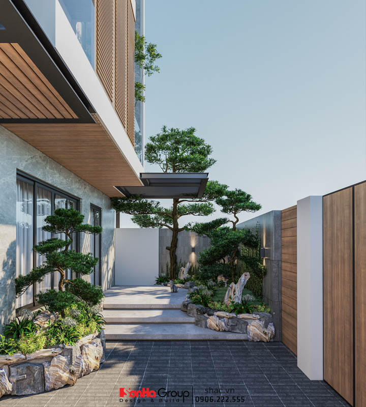 khoảng sân nhỏ bên hông nhà có tiểu cảnh cây xanh