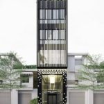 Thiết kế mặt tiền được ôm trọn bởi ánh sáng của nhà phố kinh doanh