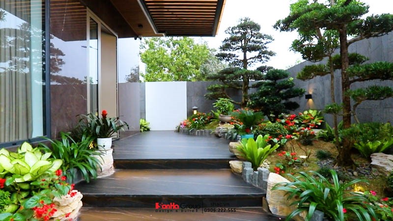 Biệt Thự 3 Tầng - Kiến Tạo Không Gian Sống Đẳng Cấp Với Thiết Kế Hiện Đại 8 Sân vườn được thiết kế ở phía trước biệt thự 3 tầng tối giản