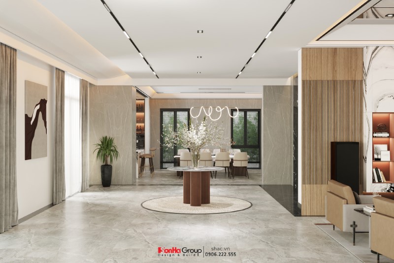 Thiết kế biệt thự hiện đại 500m2: Biến nắng Đông thành điểm sáng đặc biệt 26 Sảnh chính tầng 1 được thiết kế thoáng sáng với gam màu trắng chủ đạo và nội thất, vật liệu hiện đại, thu hút