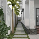 Lối đi cạnh nhà được bố trí cây xanh thoáng mát trong biệt thự song lập kết hợp kinh doanh.