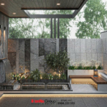 Sân trước của ngôi nhà được bố trí với cây xanh, hồ nước và ánh sáng dịu ngọt