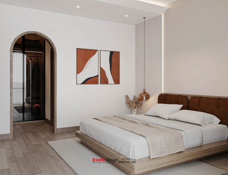 Giải pháp xây nhà ống 2 tầng 1 tum phong cách hiện đại trong ngõ nhỏ - Sơn Hà Group bậc thầy tối ưu không gian 73 Phòng ngủ tầng 2 với hệ cửa gỗ tạo vòm bo tròn cách điệu