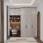 Phòng ngủ phụ với hệ tủ quần áo nối liền góc học tập giúp tiết kiệm không gian nhưng vẫn đáp ứng đầy đủ công năng cần thiết