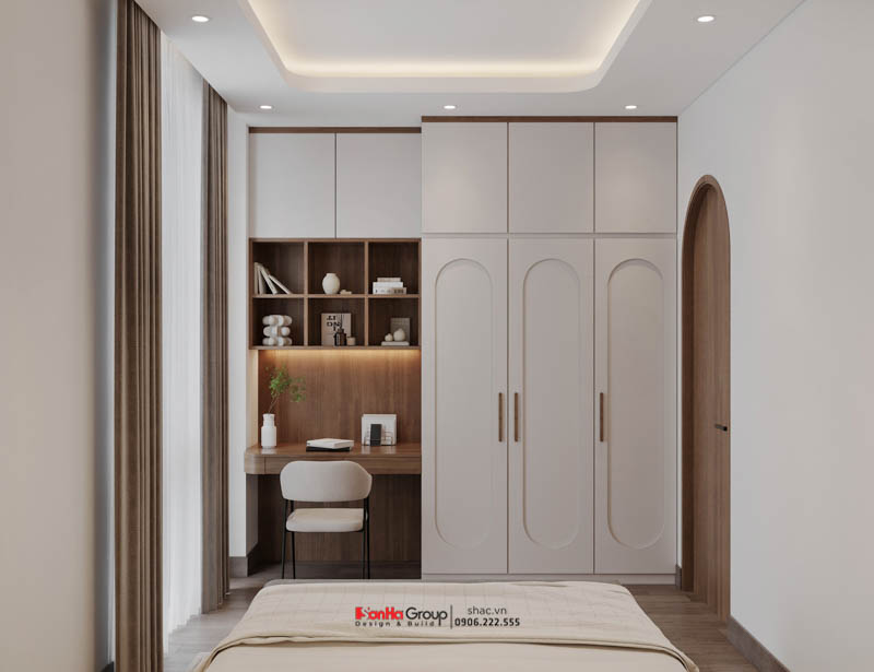 Giải pháp xây nhà ống 2 tầng 1 tum phong cách hiện đại trong ngõ nhỏ - Sơn Hà Group bậc thầy tối ưu không gian 74 Phòng ngủ phụ với hệ tủ quần áo nối liền góc học tập giúp tiết kiệm không gian nhưng vẫn đáp ứng đầy đủ công năng cần thiết