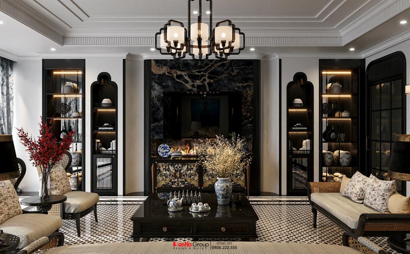 Thiết kế nhà ống Indochine 6 tầng - Kiến tạo không gian sống sang trọng và tinh tế giữa lòng Hà Nội 138 Mảng tường tivi được ốp đá hiện đại, nhấn bằng lò sưởi giả tạo nên không gian tiếp khách đầy nghệ thuật.