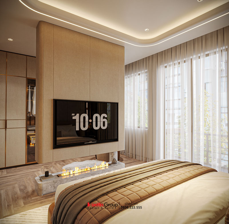 Thiết kế nội thất nhà ống hiện đại 2026: Giải mã bài toán Ánh sáng & Thông gió | Sơn Hà Group 90 Kệ tivi lửng là vách ngắn táo bạo phân chia không gian ngủ và khu thay đồ