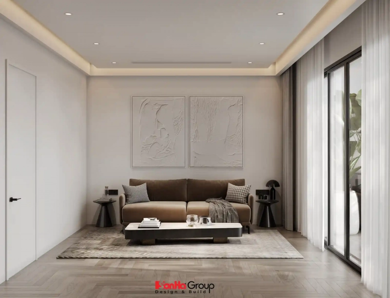 Bất ngờ với giải pháp thiết kế nội thất Vinhomes Vũ Yên khoa học cho nhà Đảo Vua có 5 con 97 Phòng sinh hoạt chung thiết kế tối giản với sofa, bàn trà và hệ tủ lớn.